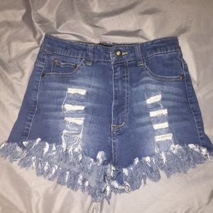 Denim ripped booty shorts