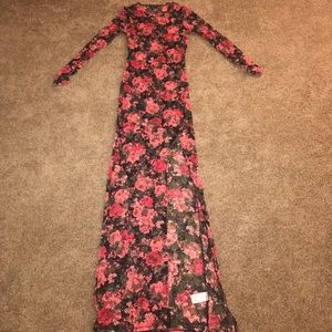 Completely lace &a sheer body con Maxie dress.