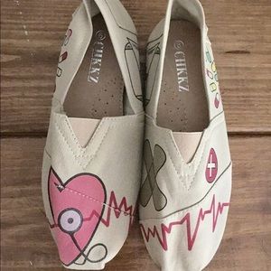 NWOT [Faux Toms] Nursing-themed shoes