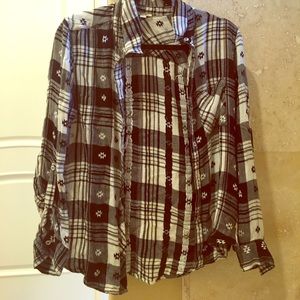 Plaid button up shirt.