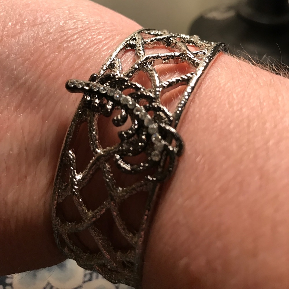 silver-toned feather bracelet