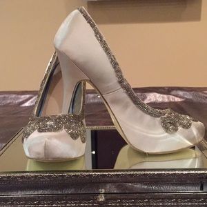 DISNEY LIMITED EDITION CHAMPAGNE SATIN HEELS.