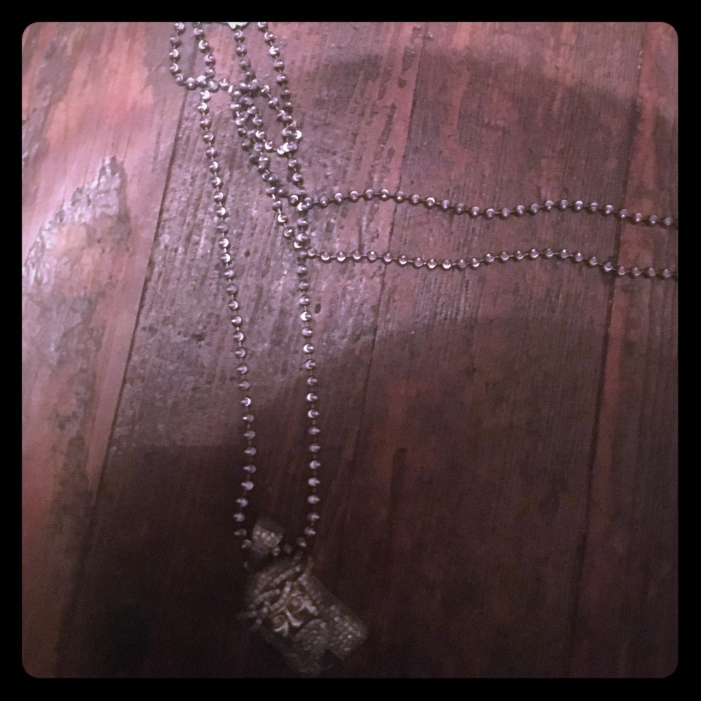 Chain and charm goin for the low