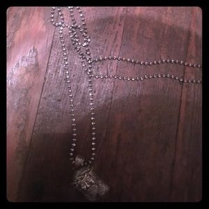 Chain and charm goin for the low