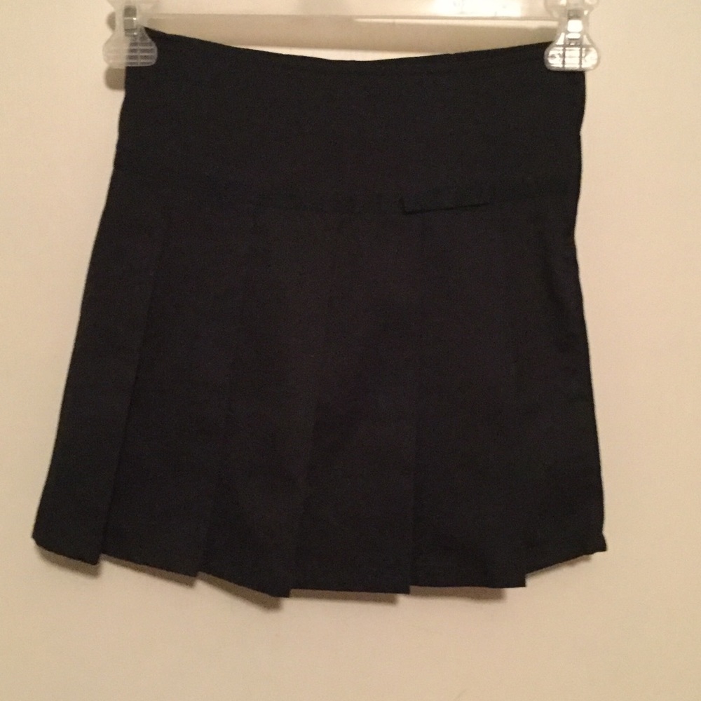 Girls school skort. Size 8. Navy blue