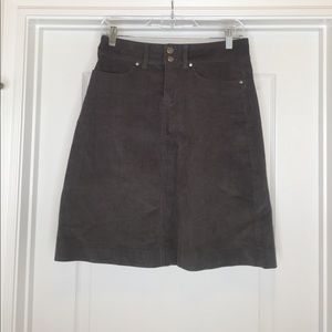 Grey knee length corduroy skirt.