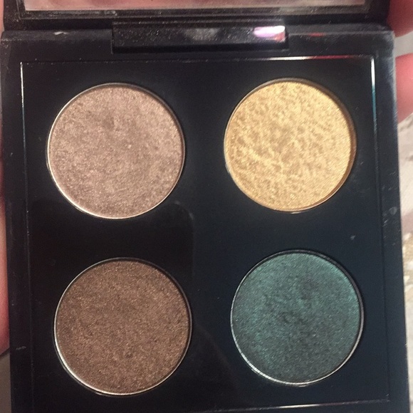 2 MAC eyeshadows and 1 MAC lipstick.