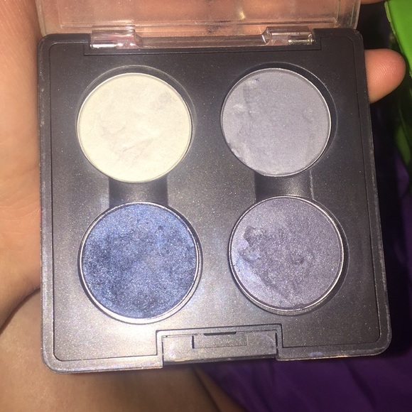 2 MAC eyeshadows and 1 MAC lipstick.