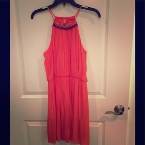Orange dress with beading around neck