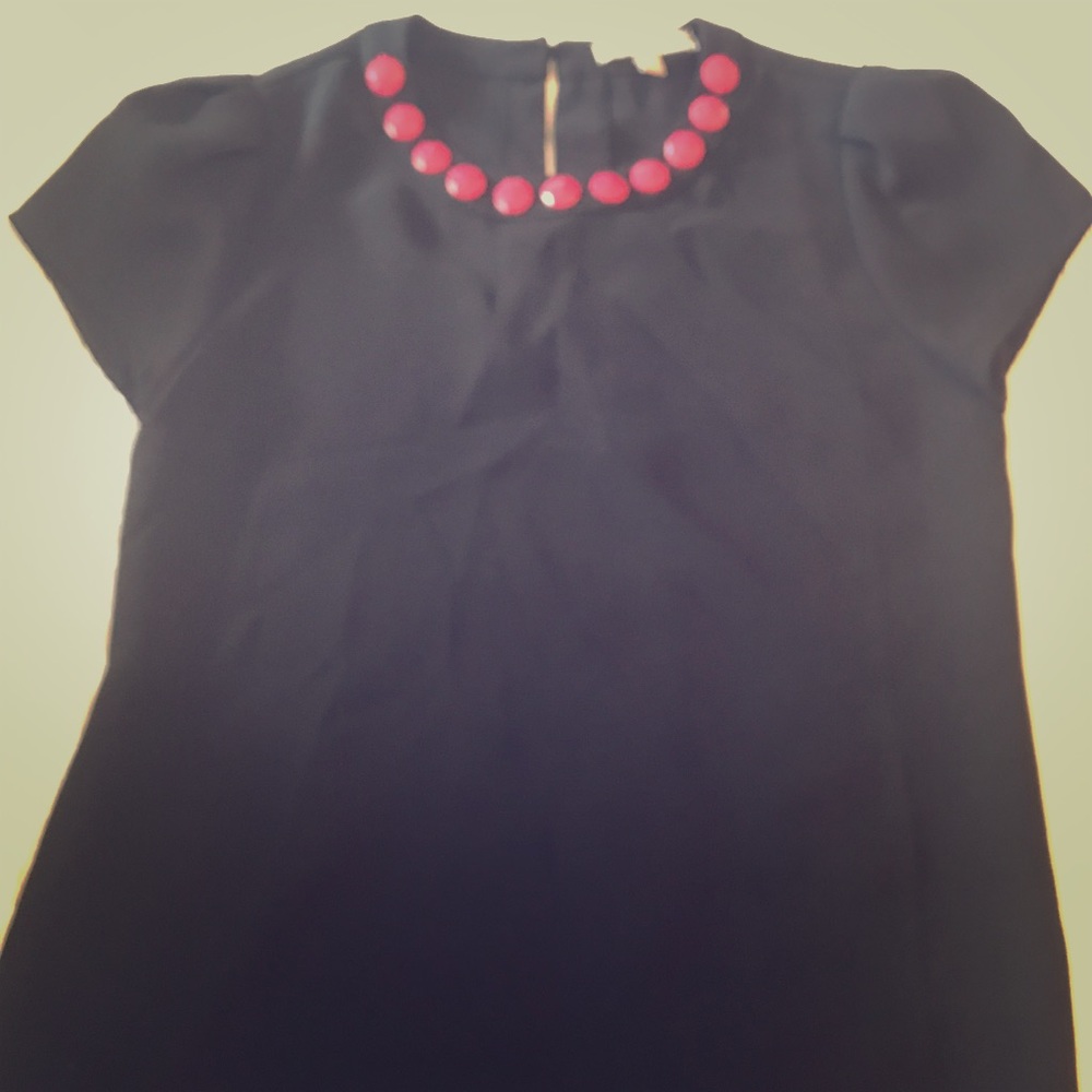 Black blouse with large pink deco