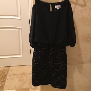 Cute little black dress with lacy bottom.