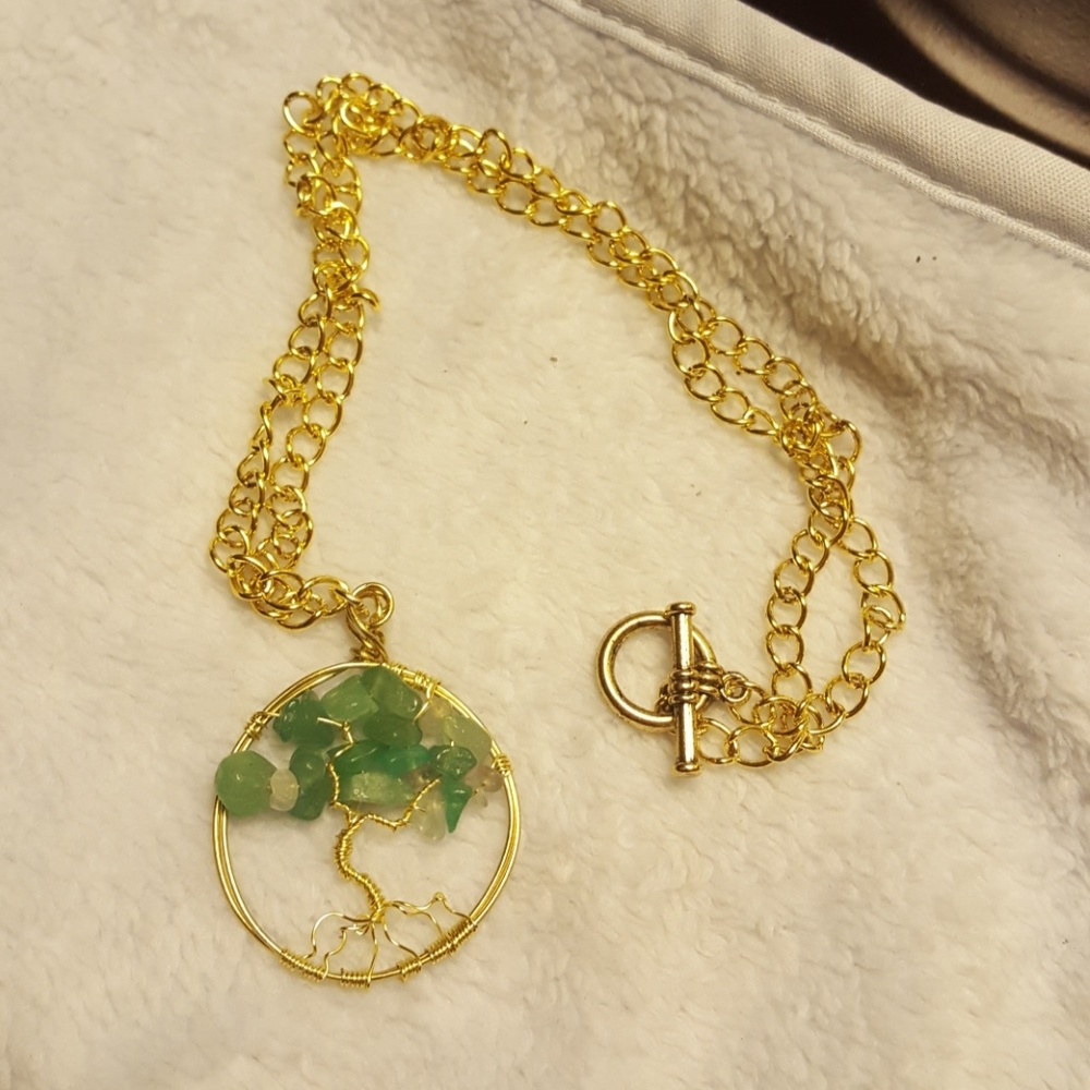 Tree of life pendant on gold chain