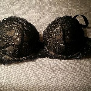 Black and tan lace bra