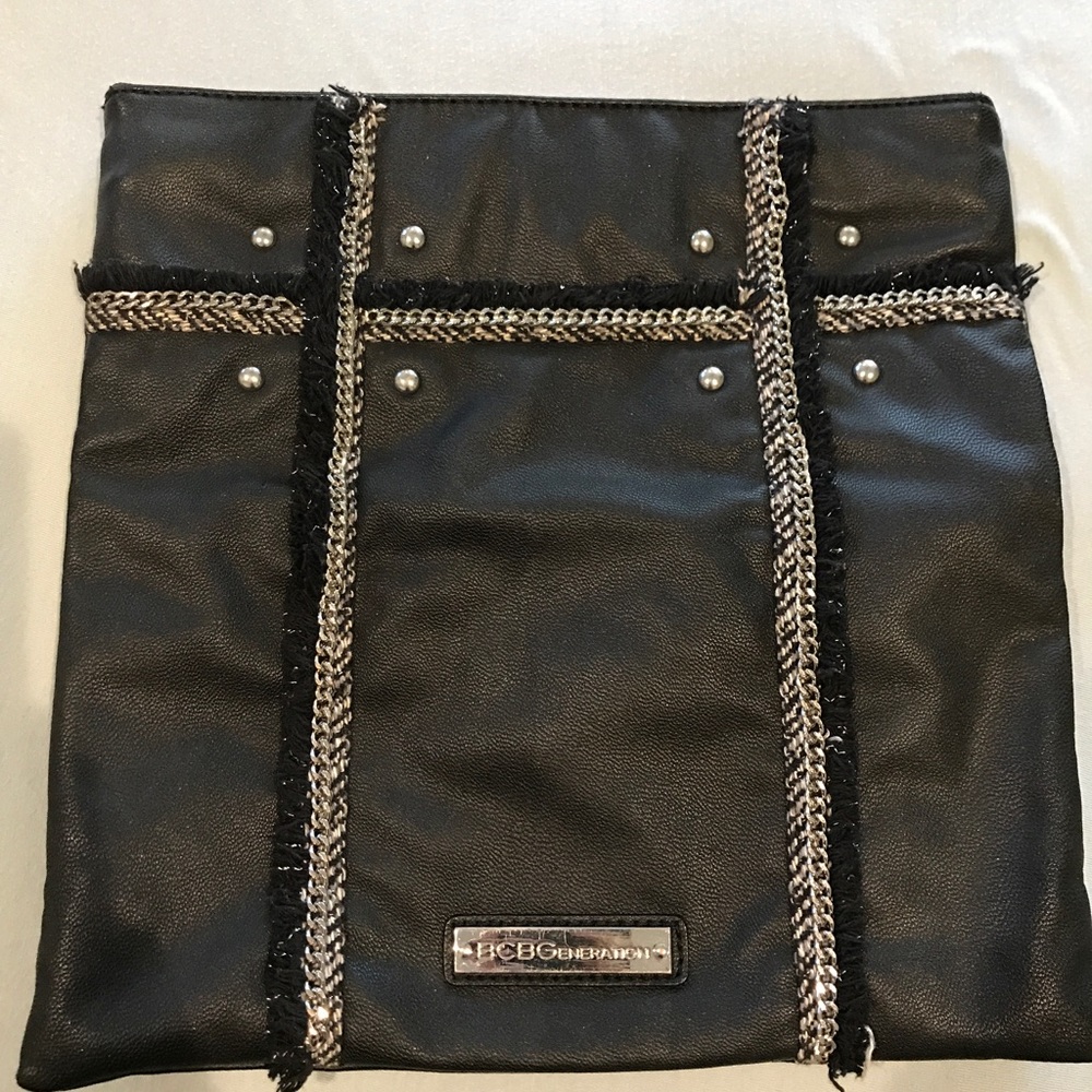 Hip, but chic fashionable clutch BCBGeneration