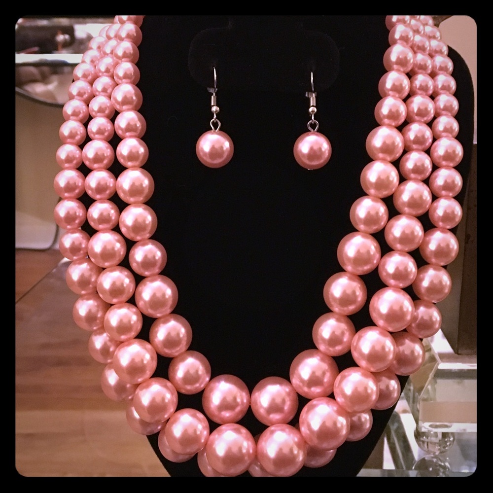 Three strand pink pearls