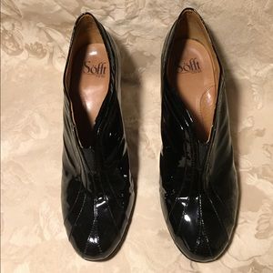 Black Sofft brand patent leather heels.