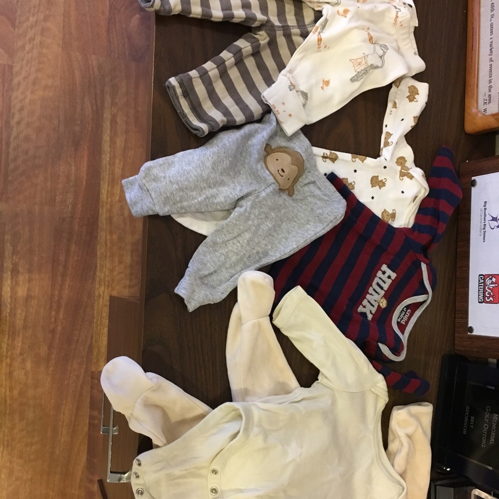 Lot of two outfits.  NB and 0-3 mos.
