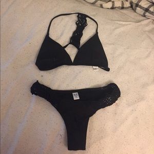 Black bathing suit size M but fits like a S