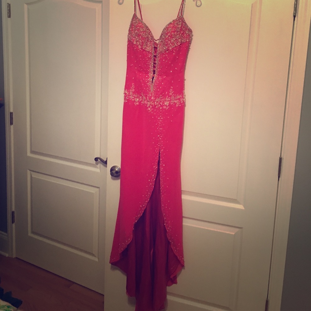 Gorgeous pink ball gown with deep beaded V