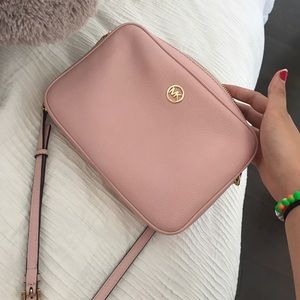 Pink Michael Kors cross body bag