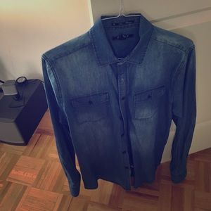 Denim buttondown. Makes your pecs look bigger.