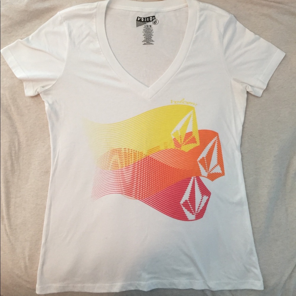 White tee shirt with yellow orange and red design