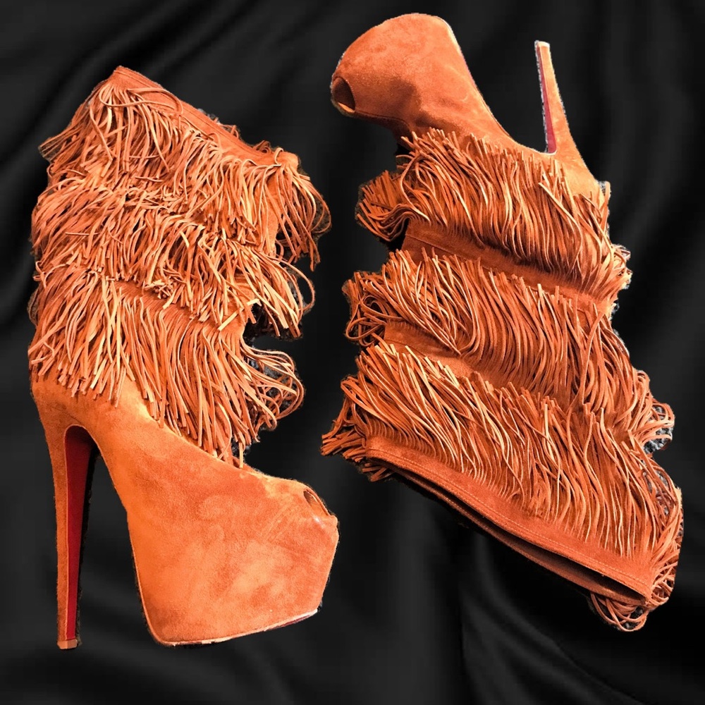 Christian Louboutin Anniversary suede boots.