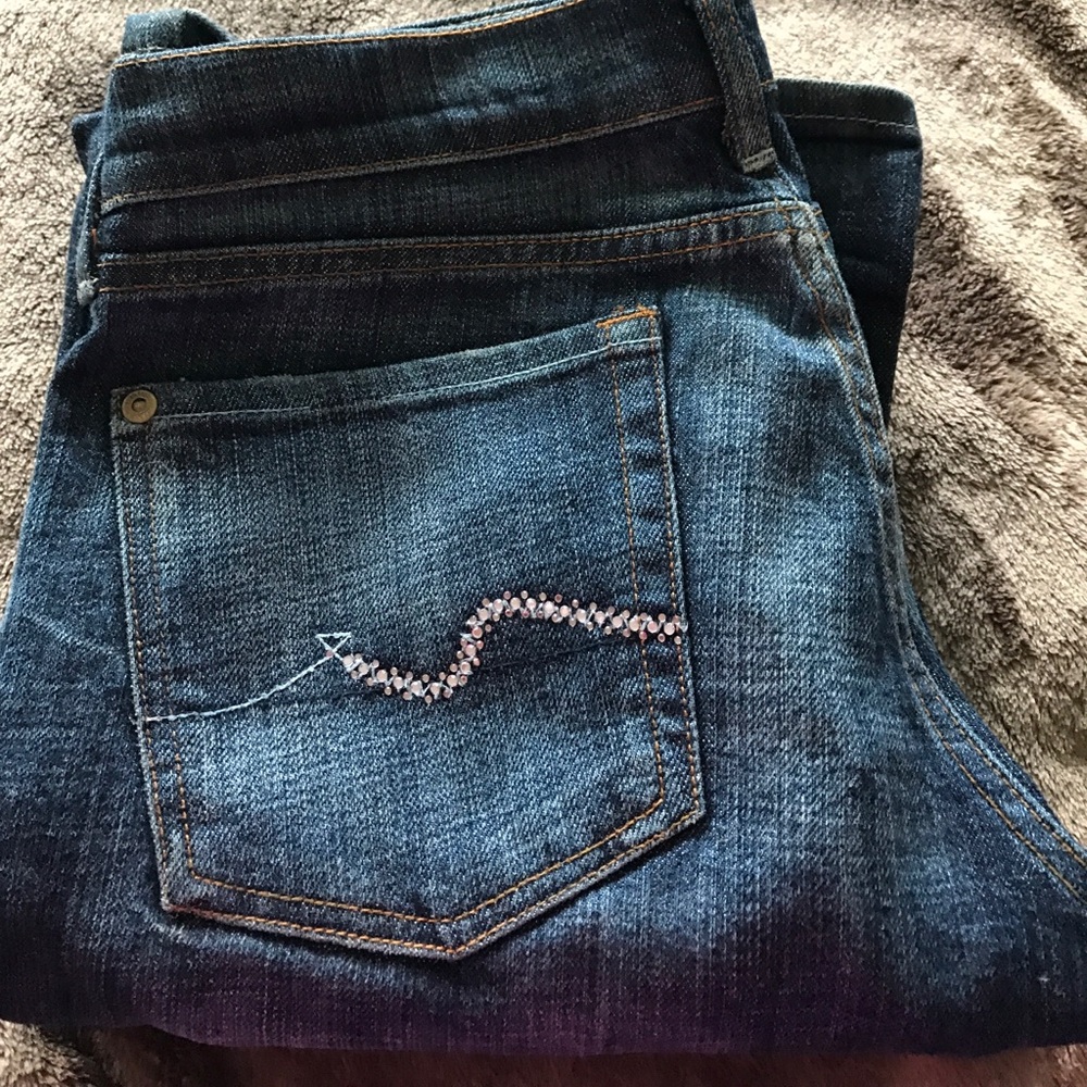 On sale Boot cut 7 jeans with pink rhinestones