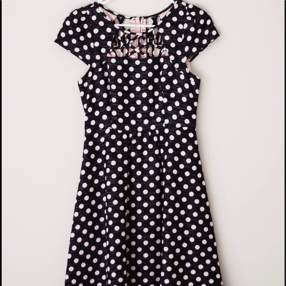 Black dress with white polka dots cap sleeve
