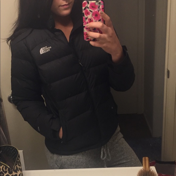 black puffy north face jacket