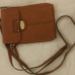 Compact born crossbody