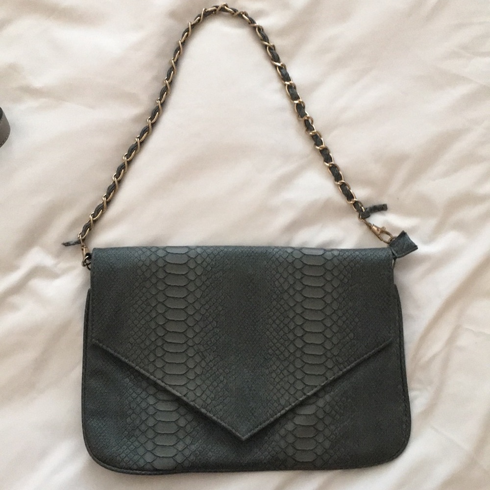 Soft teal snakeskin clutch/purse!