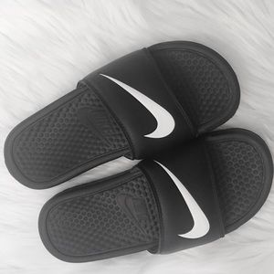 Black Nike slides