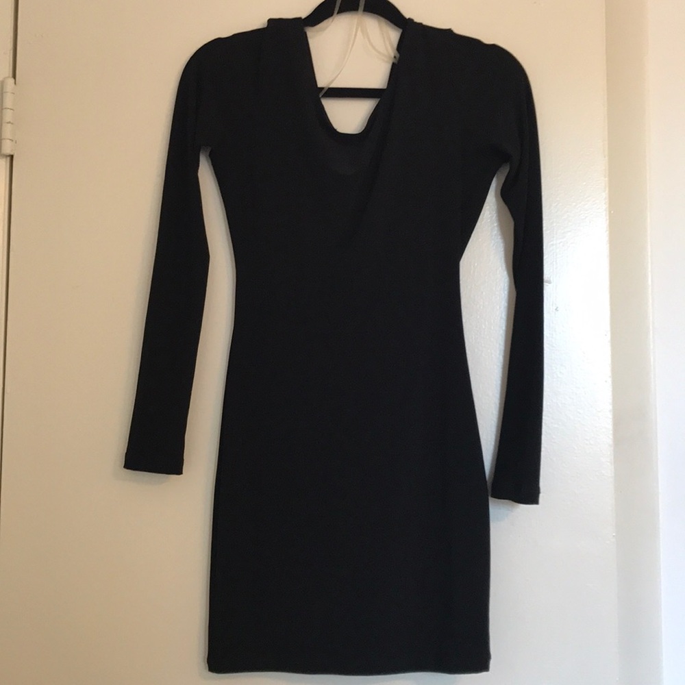 Long sleeve black dress.