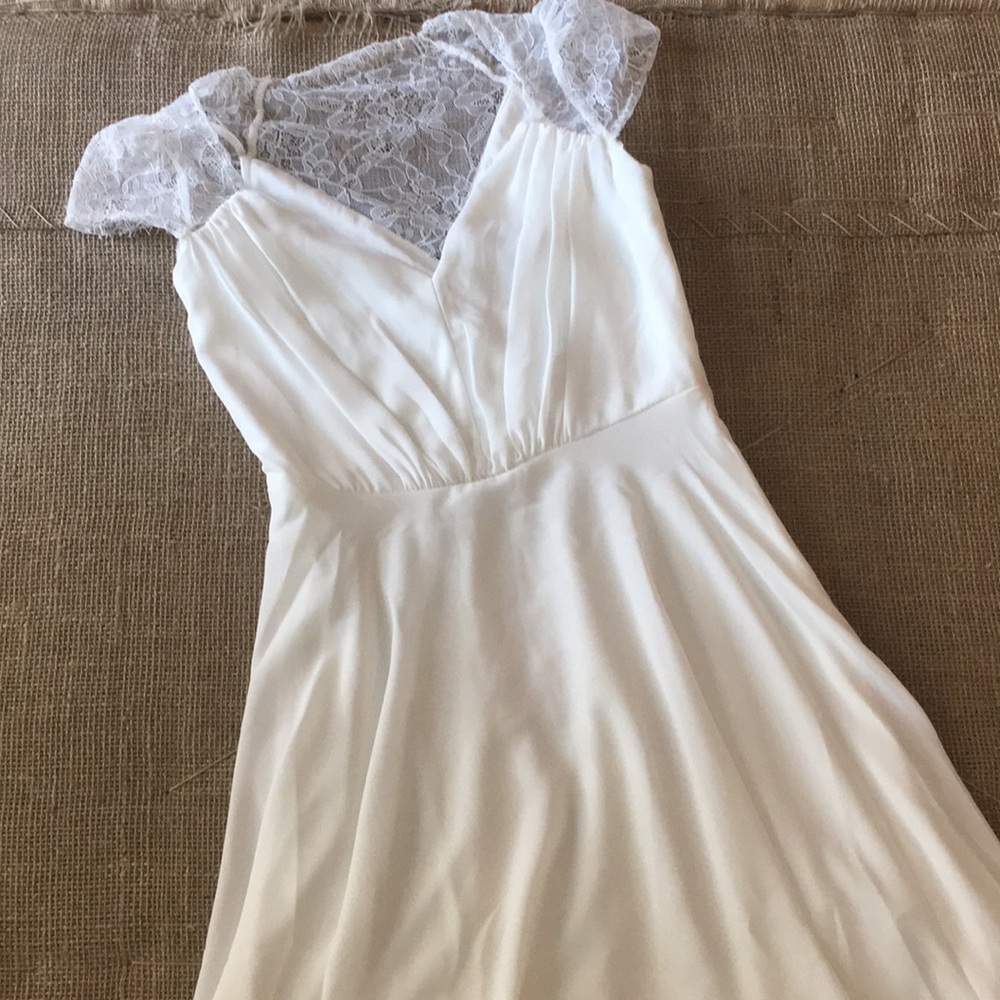 White lace capped sleeved dress