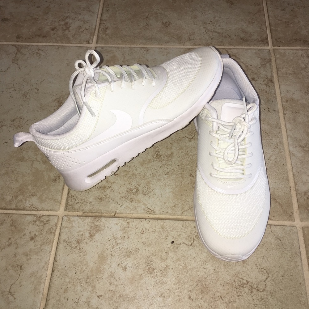 All white Nike air max theas