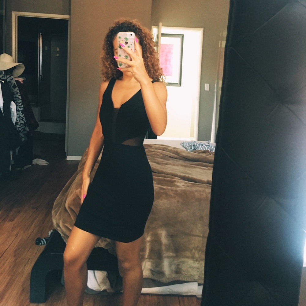 Black fitted dress with sheer
