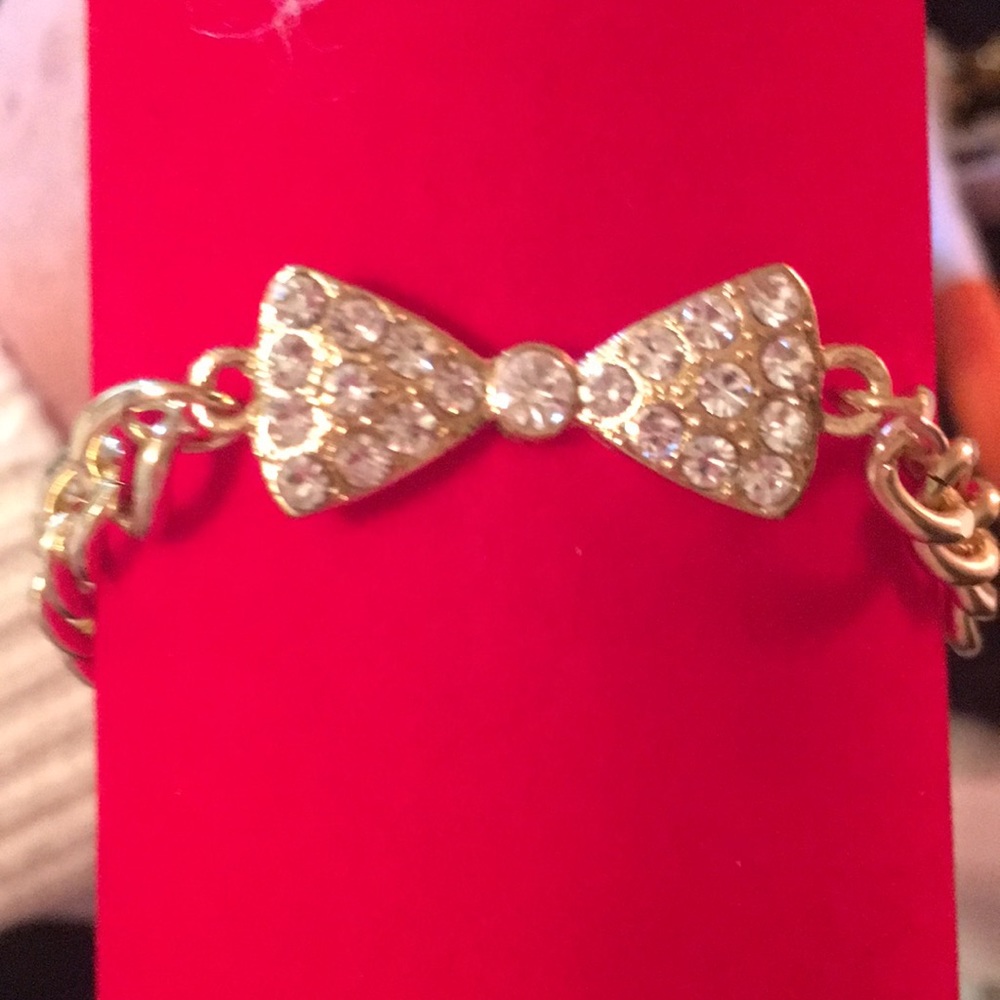 Chrystal now on gold plated chain bracelet