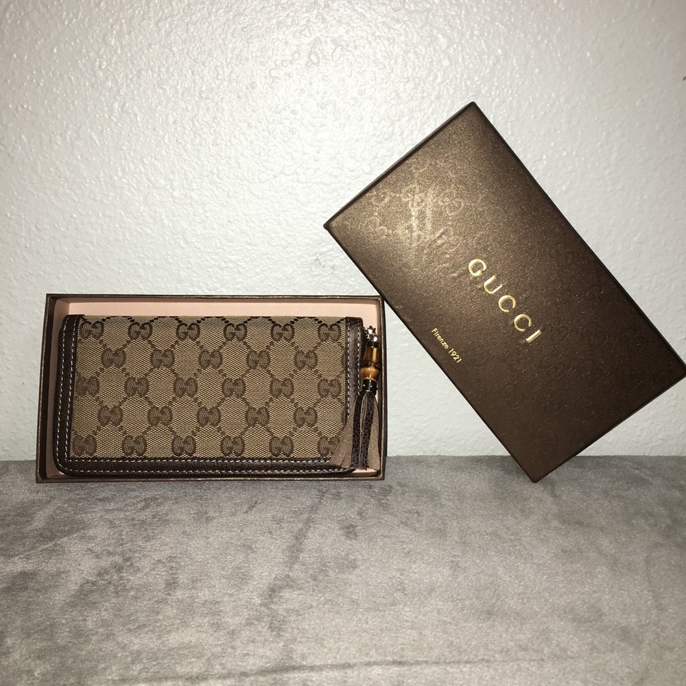 Gucci Monogram wallet with bamboo tassel