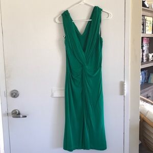 Green form fitting Bebe dress