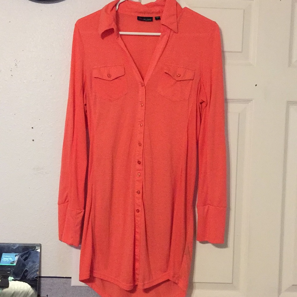 Orange long sleeve dress.