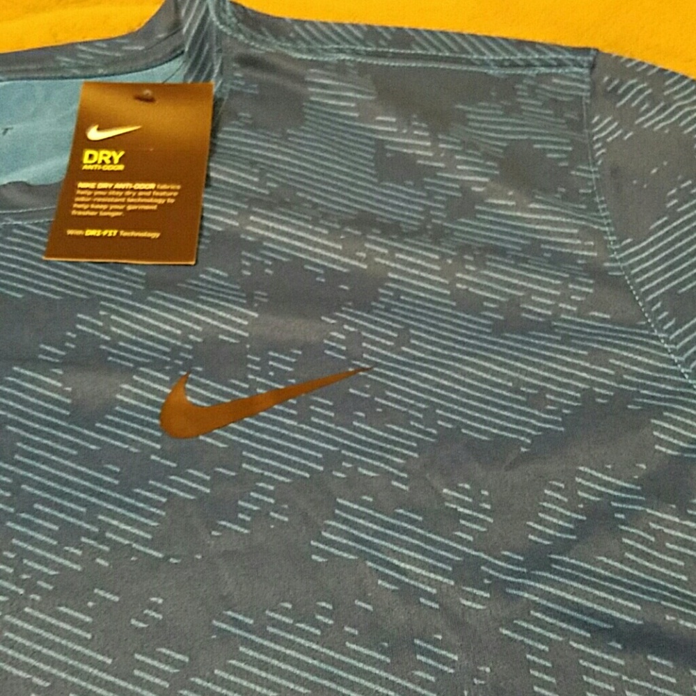 Nike Dri Fit Top - The Global Tee
