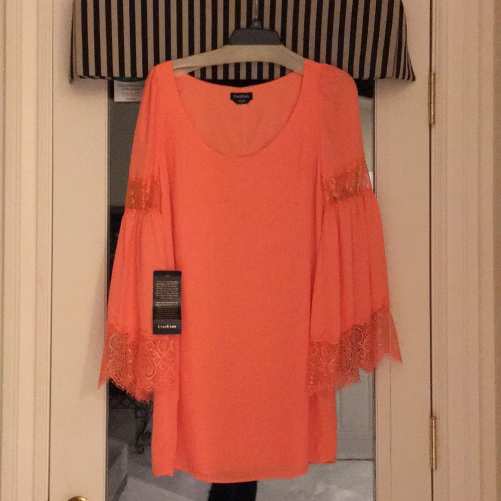 Bebe orange dress with lace sleeves
