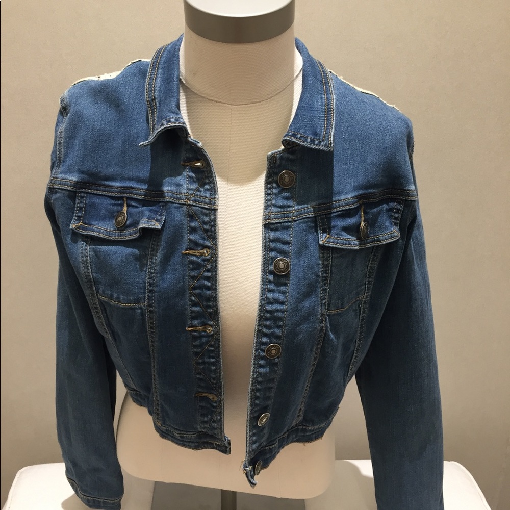 Denim jacket with lace.