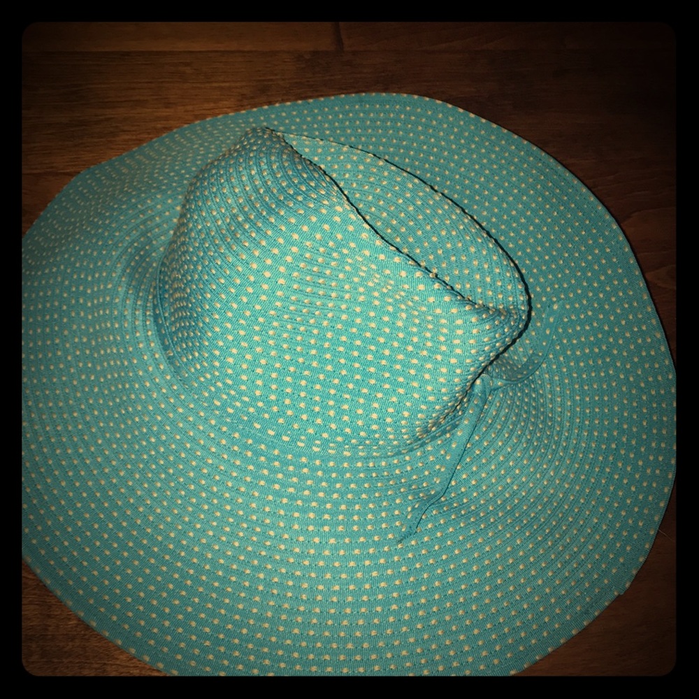 A big floppy blue hat