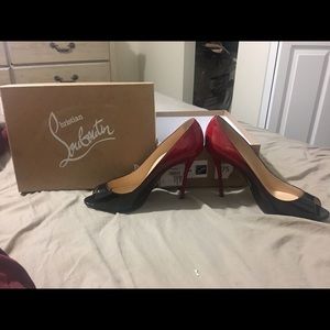 Christian Louboutin 640$. Worn once no marks