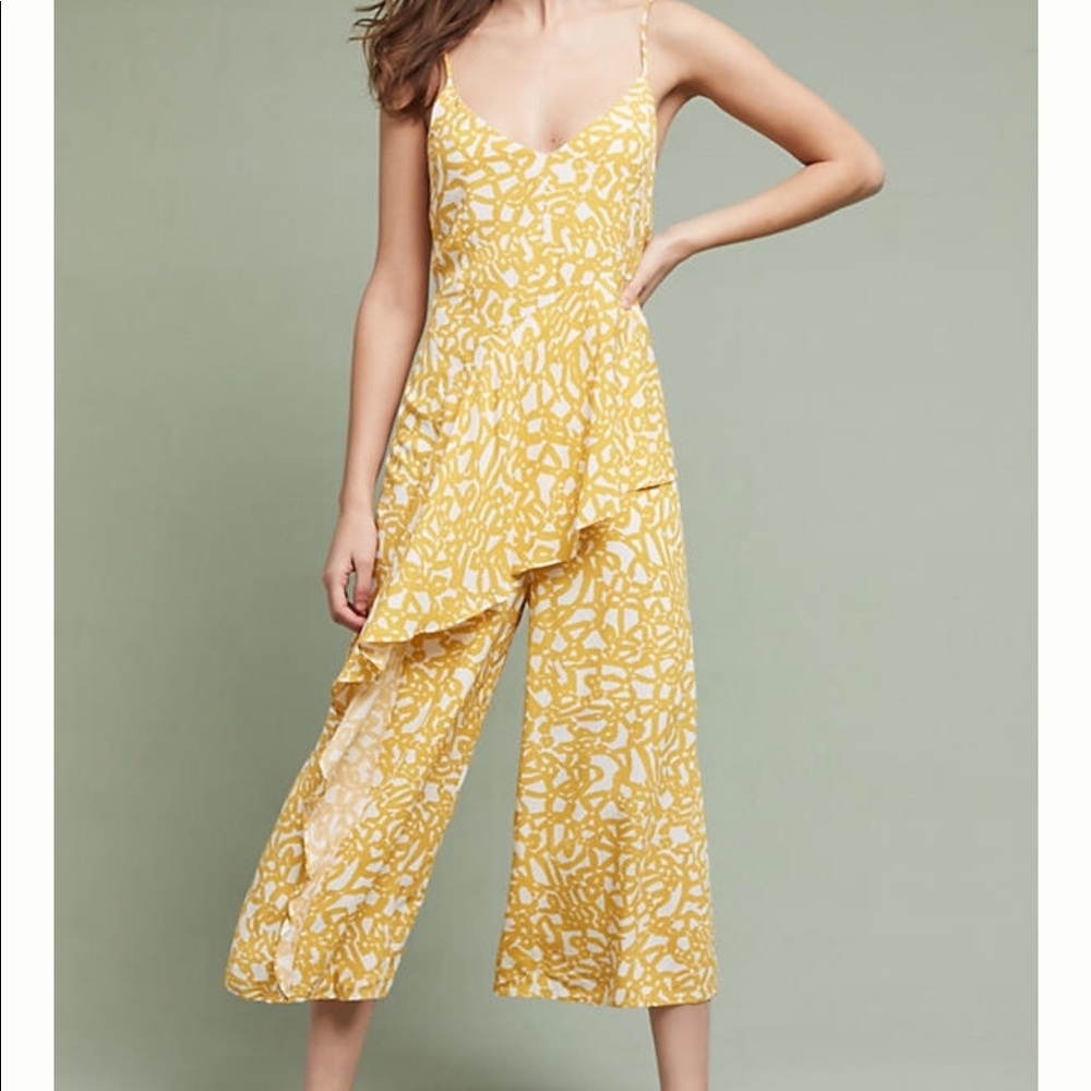 White and yellow printed flare leg jumpsuit