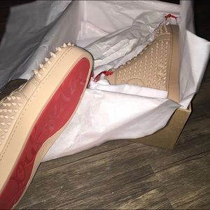 White ivory Louboutin's