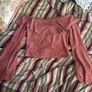 Off shoulder pink draped shirt