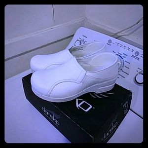 All white Dansko Nursing shoes
